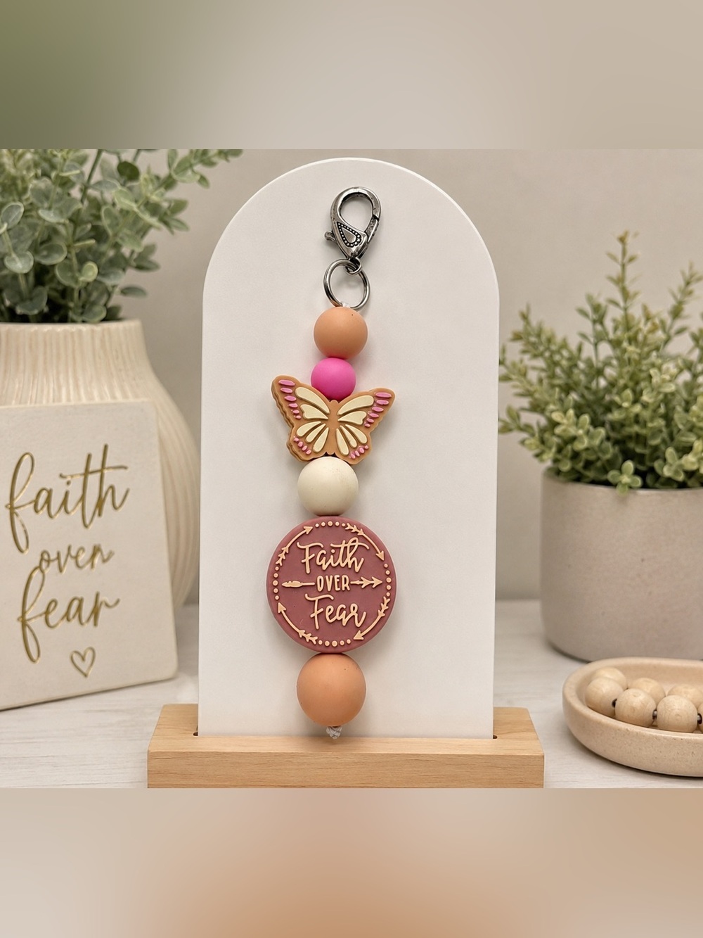 Handcrafted Pink and Cream Keychain with Butterfly and Faith Charm